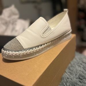 White rhinestone slip ons. Super comfy!!!Only worn a couple of times!